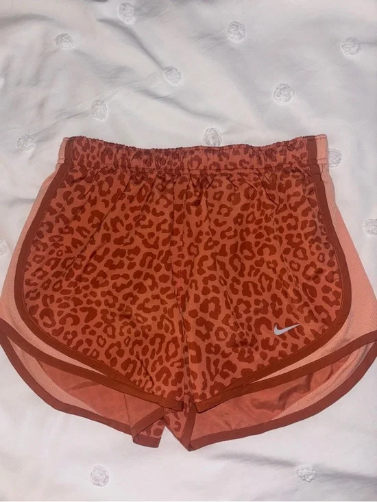 Nike Women’s Orange Leopard Print Running Shorts - Picture 1 of 3